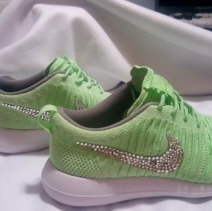 Ladies green with Swaroski swoosh Nike tennis shoes size 7.5